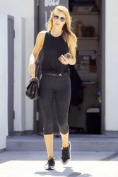 29617581_Rosie-Huntington-Whiteley-in-Ti